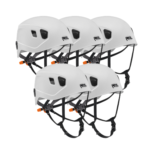 A group of five white Petzl Panga helmets, featuring easily adjustable chinstraps and durable shells for head protection in outdoor adventure sports.