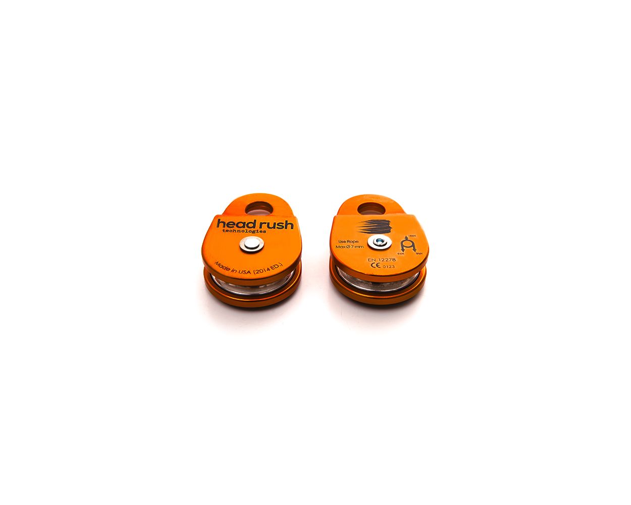 two orange pulleys branded with "head rush technologies.