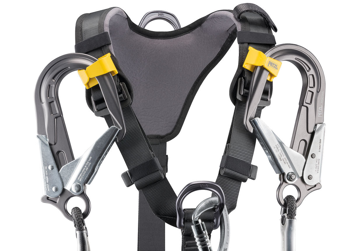 The Petzl AVAO BOD international version harness . The MGO connectors on fall arrest lanyards can be stowed on each shoulder strap.