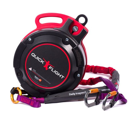 The QuickFlight Free Fall Device, with its compact and robust black and red case, attached to a purple and red webbing lanyard with carabiners, designed for controlled descents in adventure sports.