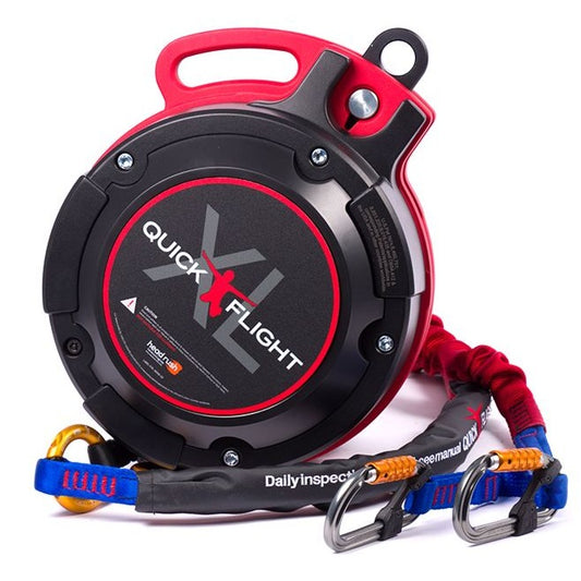 The QuickFlight XL Free Fall Device featuring a sturdy black and red casing, with an oversized design for enhanced performance, accompanied by a blue and red webbing lanyard for. adventure activities.